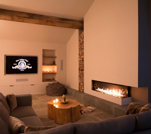 Barn Lounge with Log Stack contemporary-vardagsrum
