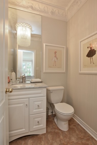 Photo of a contemporary powder room in Toronto.