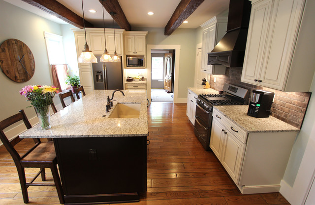 Painted Cream With Brown Glaze Cabinets With Giallo Granite