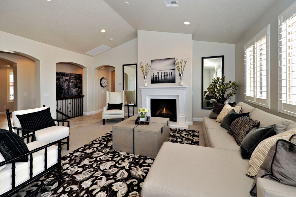This is an example of a transitional living room in Salt Lake City with grey walls.