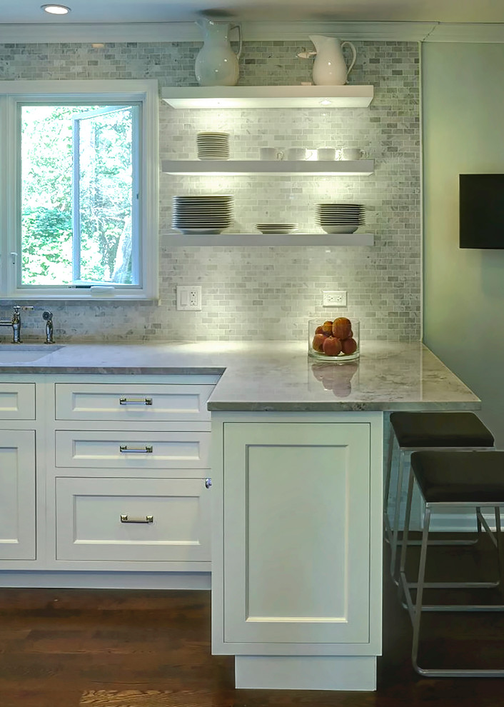 Inspiration for a mid-sized transitional galley eat-in kitchen in Chicago with an undermount sink, white cabinets, quartzite benchtops, multi-coloured splashback, stone tile splashback, stainless steel appliances, dark hardwood floors, a peninsula and shaker cabinets.