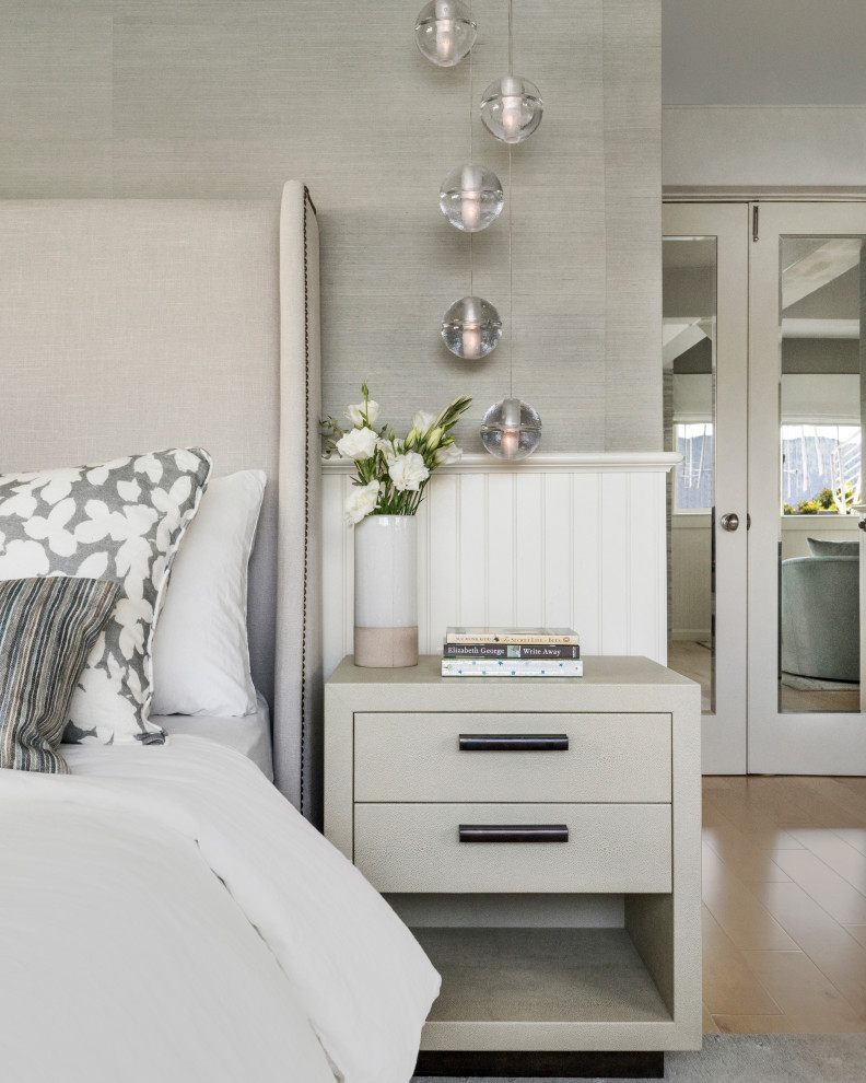 Photo of a medium sized coastal bedroom in San Francisco with grey walls and wallpapered walls.