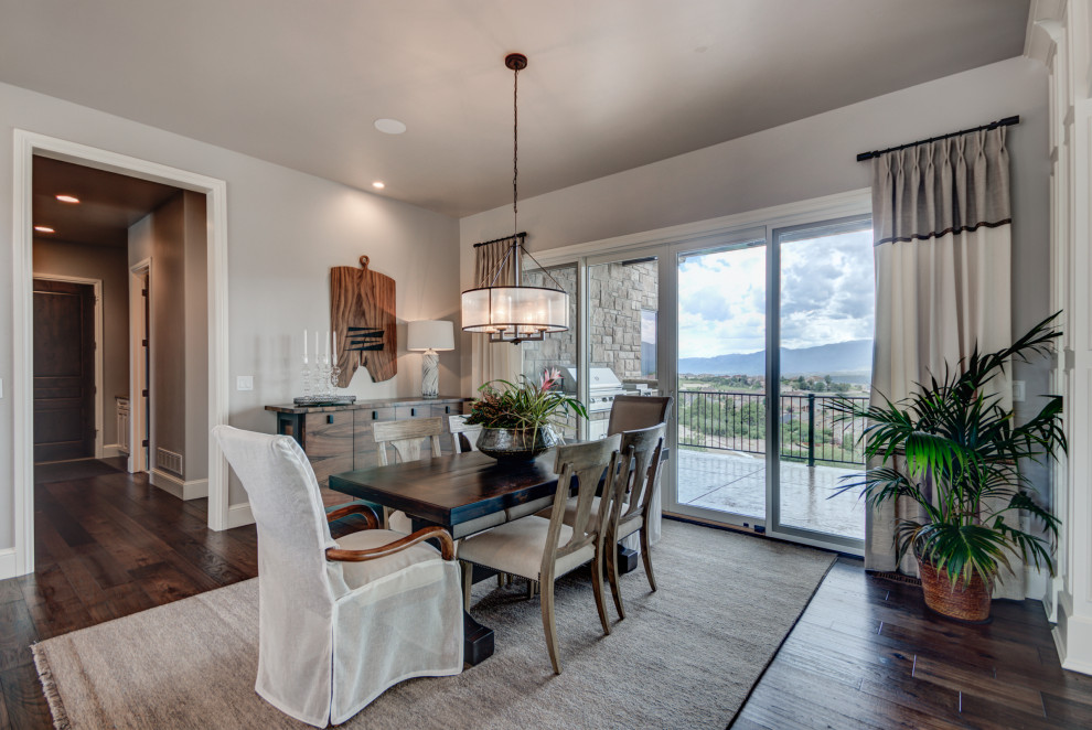 Example of a transitional home design design in Denver