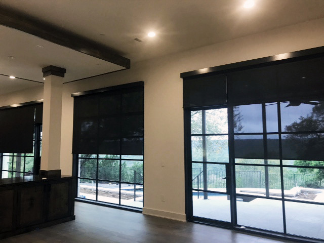 Example of a transitional home design design in Austin