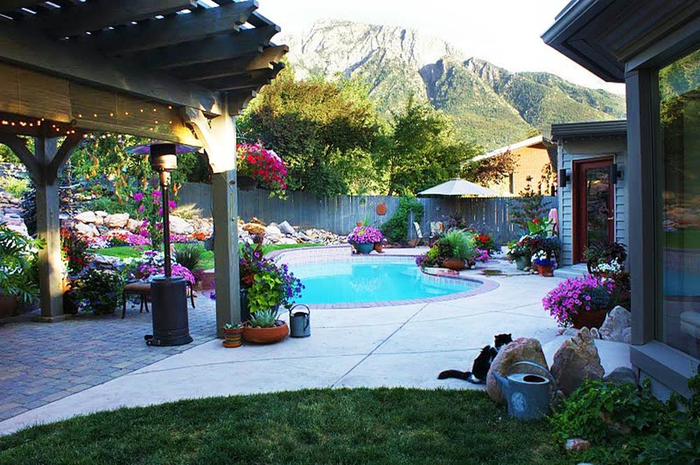 Example of a patio fountain design in Salt Lake City with a pergola
