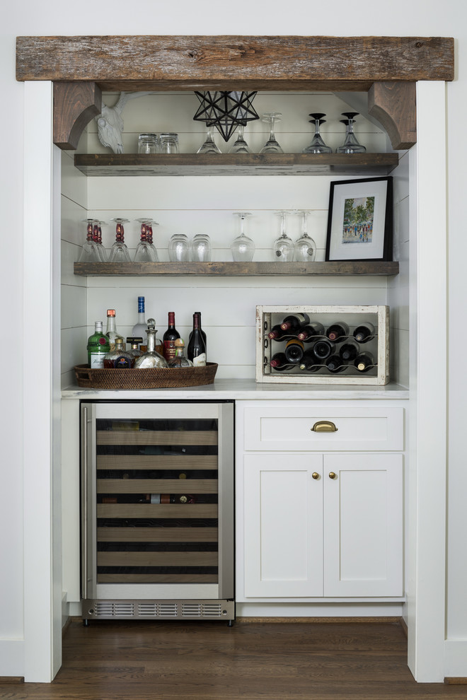 This is an example of a transitional home bar in Birmingham.