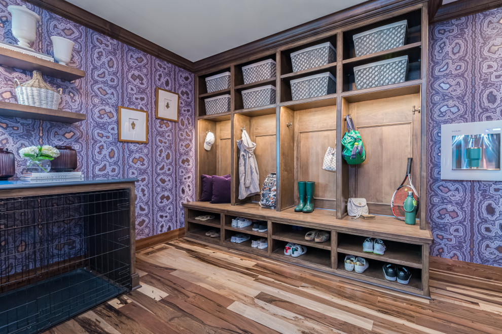 Design ideas for a mid-sized transitional mudroom in Milwaukee with purple walls, medium hardwood floors, wallpaper and brown floor.
