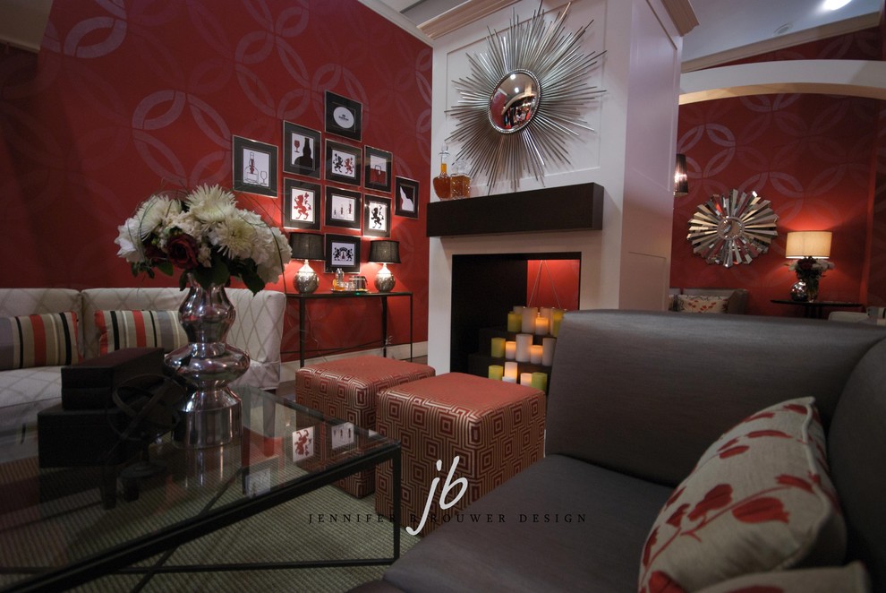 Inspiration for a mid-sized traditional living room in Toronto with red walls and carpet.