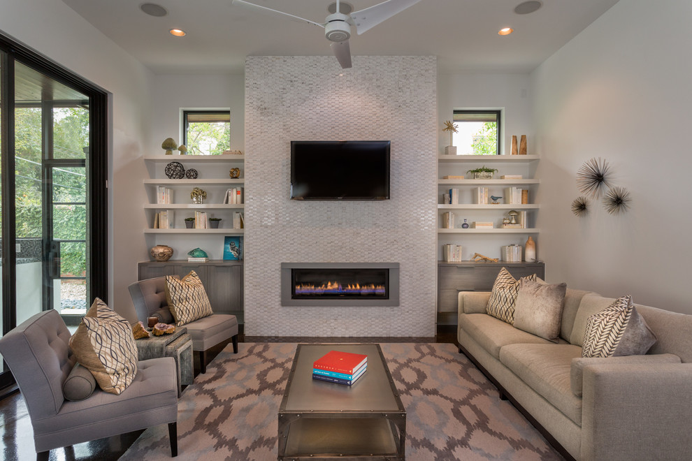This is an example of a mid-sized contemporary living room in Austin with a ribbon fireplace and a wall-mounted tv.