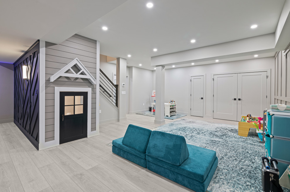 Exemple d'une petite chambre d'enfant de 1 à 3 ans moderne avec un sol en vinyl, un sol gris, un plafond voûté et un mur gris.