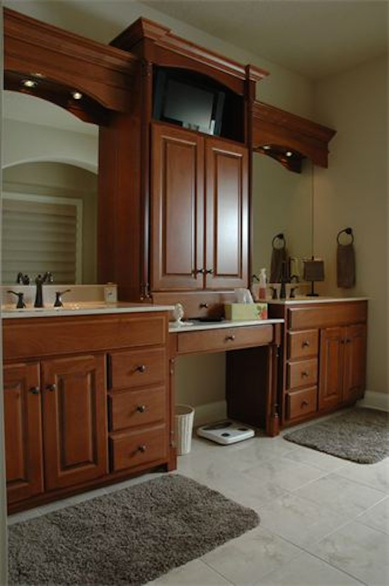 Inspiration for a large master ceramic tile bathroom remodel with medium tone wood cabinets and beige walls
