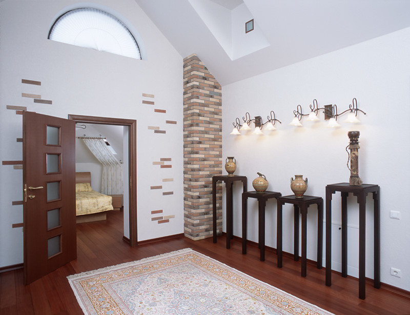 Загородный дом в классическом стиле с элементами этники