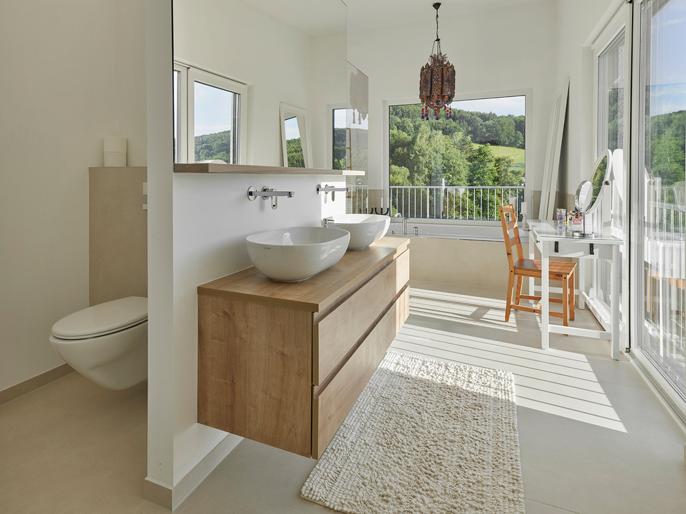 Design ideas for a country bathroom with white walls.