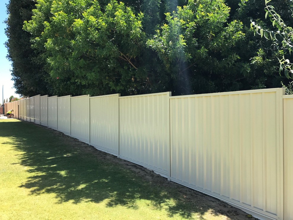 Large modern backyard garden in Perth.