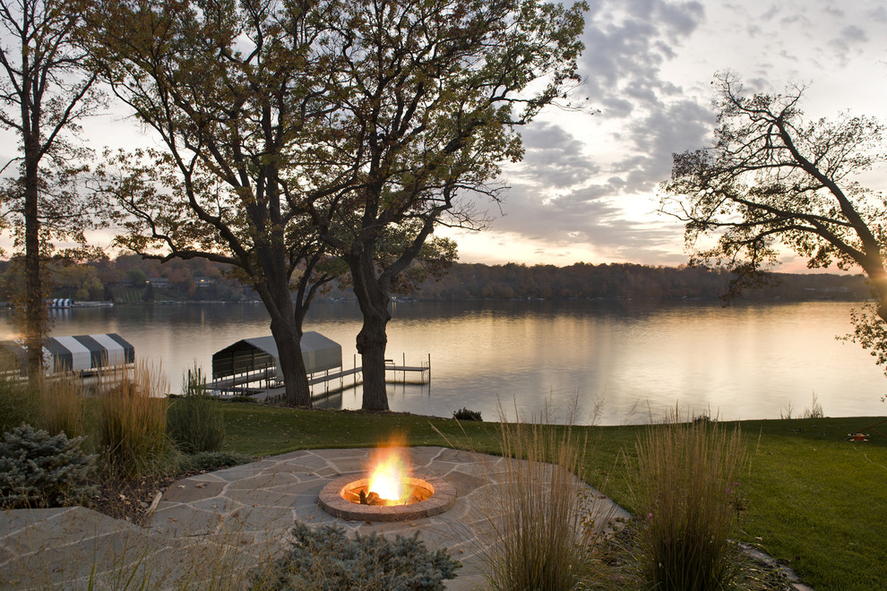 Inspiration for a traditional garden in Minneapolis with a water feature.