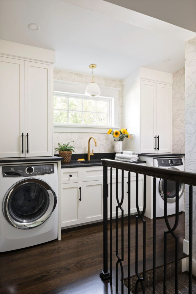 Design ideas for a mid-sized contemporary galley dedicated laundry room in Tampa with an undermount sink, shaker cabinets, white cabinets, white walls and dark hardwood floors.