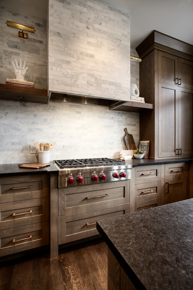 Example of a transitional kitchen design in Calgary