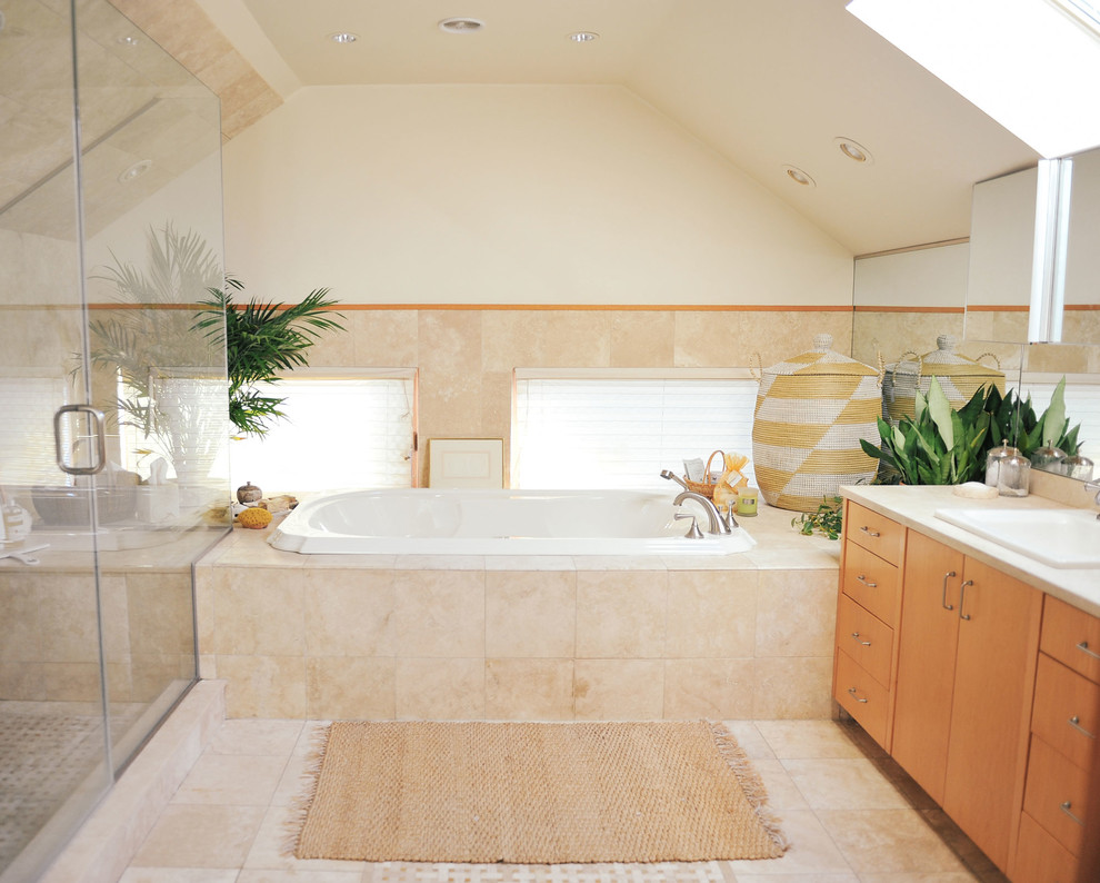 Mid-sized traditional master wet room bathroom in Other with furniture-like cabinets, light wood cabinets, an alcove tub, beige tile, stone tile, white walls, ceramic floors, a drop-in sink, tile benchtops, beige floor and an open shower.