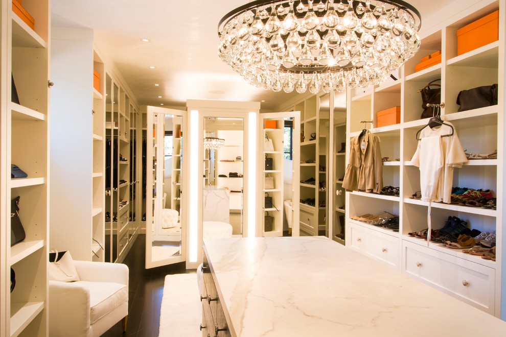 This is an example of an expansive mediterranean storage and wardrobe in Los Angeles.