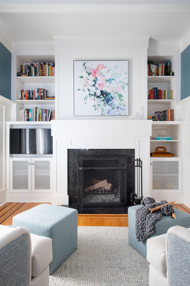 Mid-sized transitional enclosed living room in Vancouver with blue walls, medium hardwood floors, a standard fireplace, a stone fireplace surround, orange floor, recessed and decorative wall panelling.