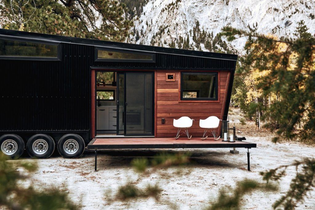 Modern Mountain Tiny Home with Fold Out Deck in Winter