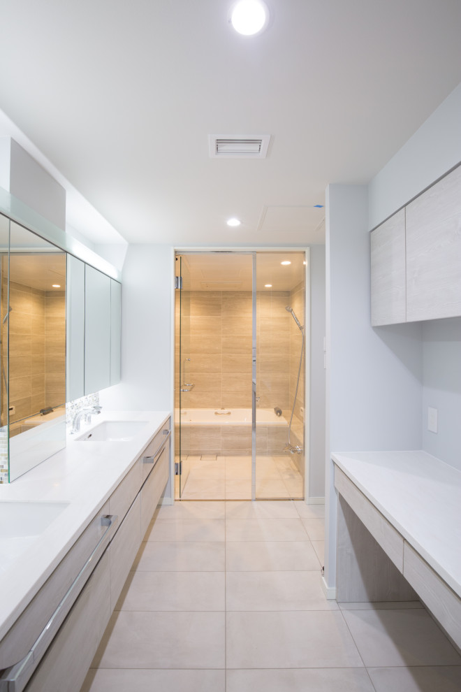 Design ideas for a large contemporary bathroom in Tokyo with glass-front cabinets, white cabinets, gray tile, glass tile, white walls, ceramic floors, an undermount sink, solid surface benchtops, beige floor, white benchtops, a floating vanity and wallpaper.