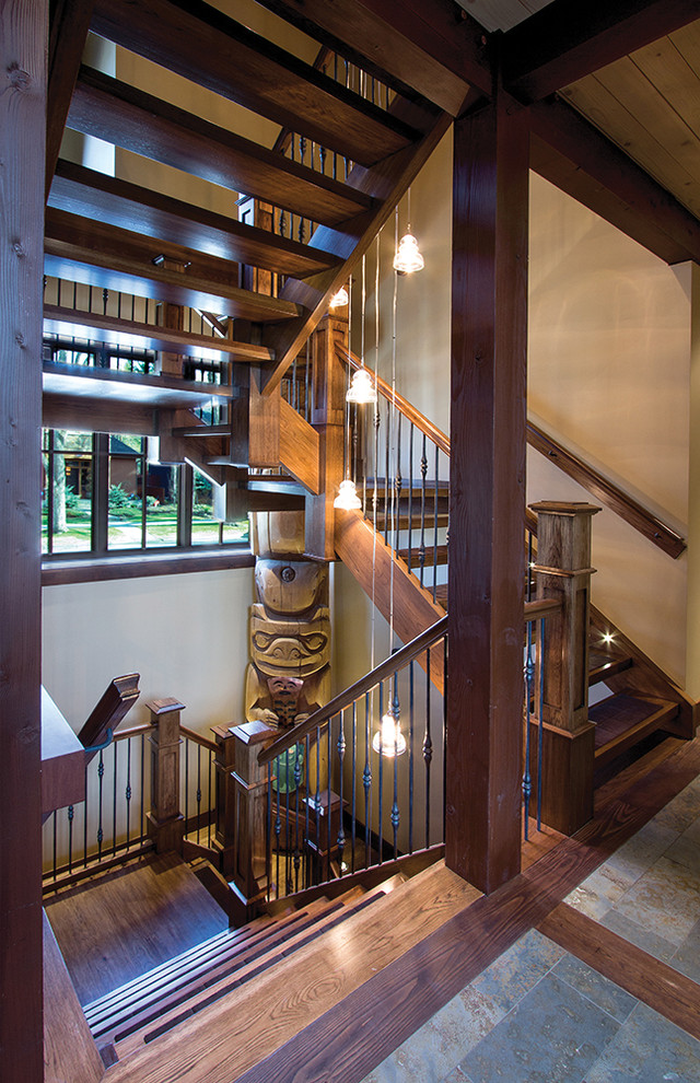 Design ideas for a large eclectic wood u-shaped staircase in Calgary with open risers.