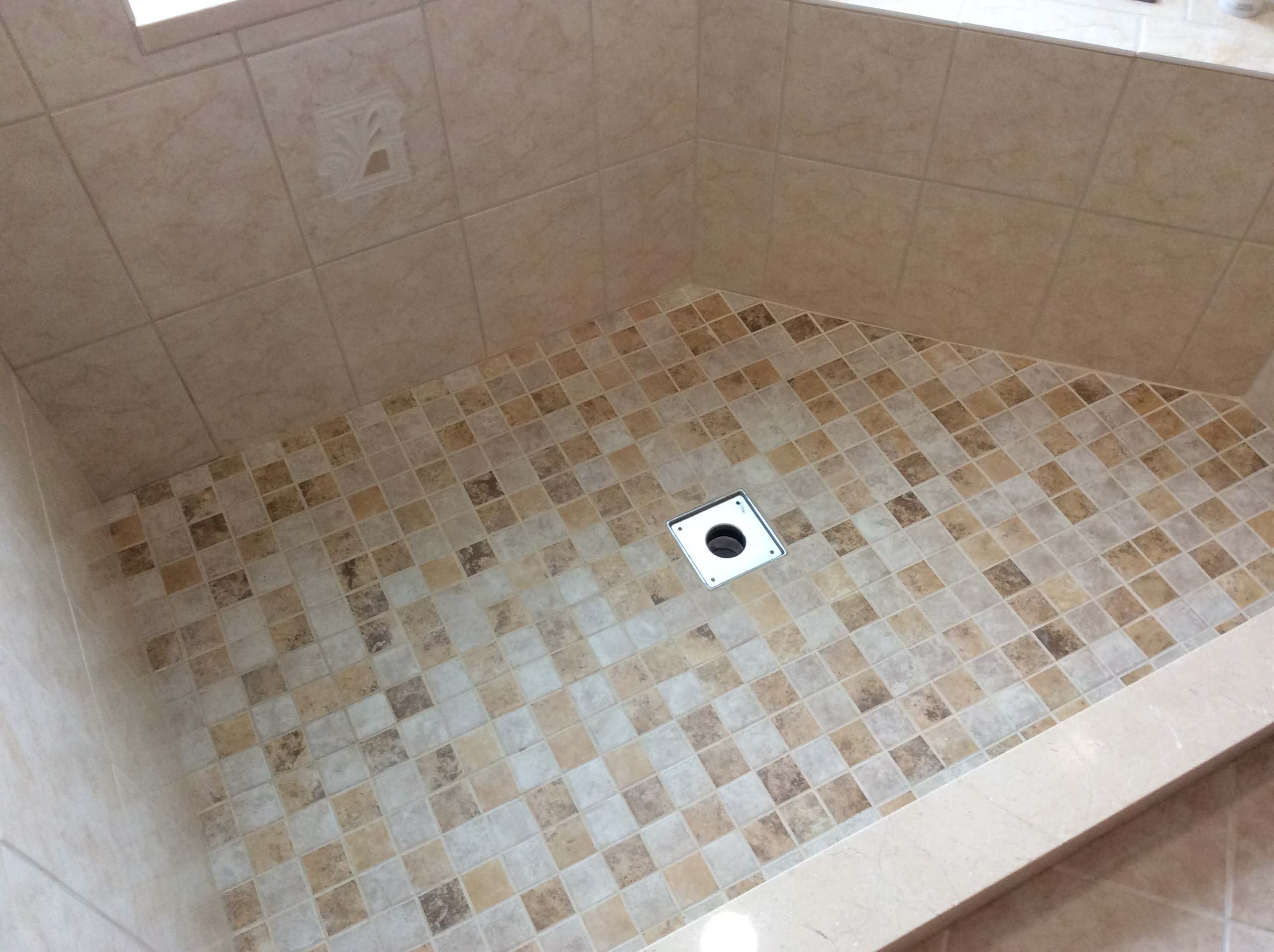 Master Bathroom Walk-in Shower with Triangle Seat
