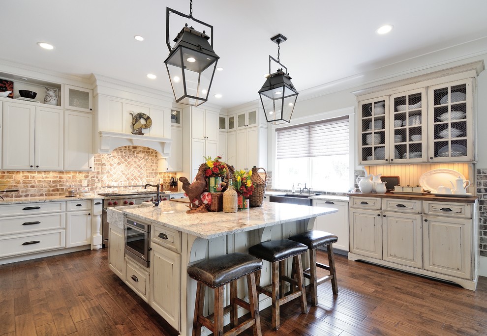 Photo of a traditional kitchen in Atlanta with distressed cabinets.