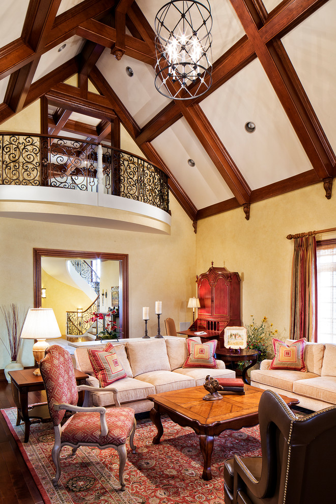 Inspiration for a large traditional formal living room in Other with yellow walls and dark hardwood floors.
