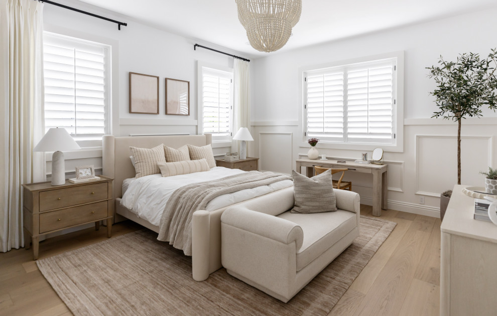 Worth the Wait - Inspiration for a transitional light wood floor, beige floor and wainscoting bedroom remodel in Phoenix with white walls