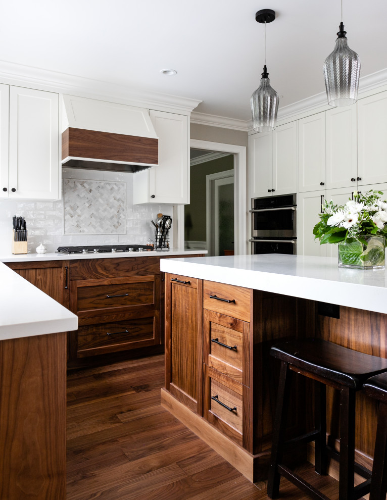 Example of a transitional kitchen design in Vancouver