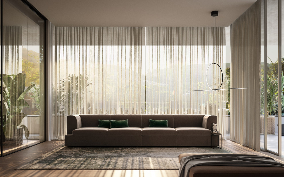 Idee per un ampio soggiorno design stile loft con pareti beige, parquet chiaro e boiserie