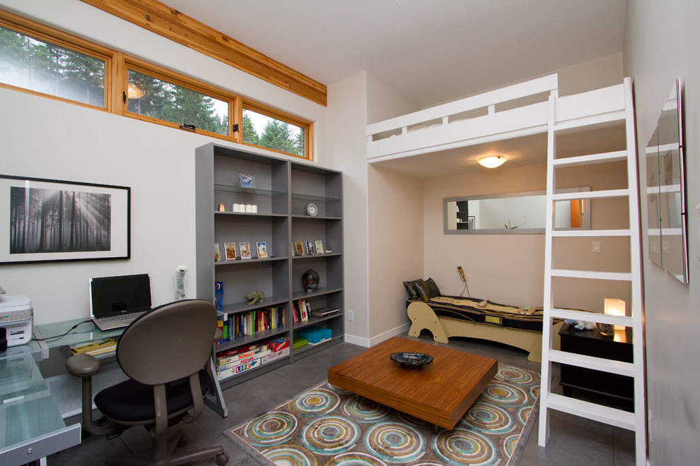 Transitional kids' room in Vancouver with concrete floors.