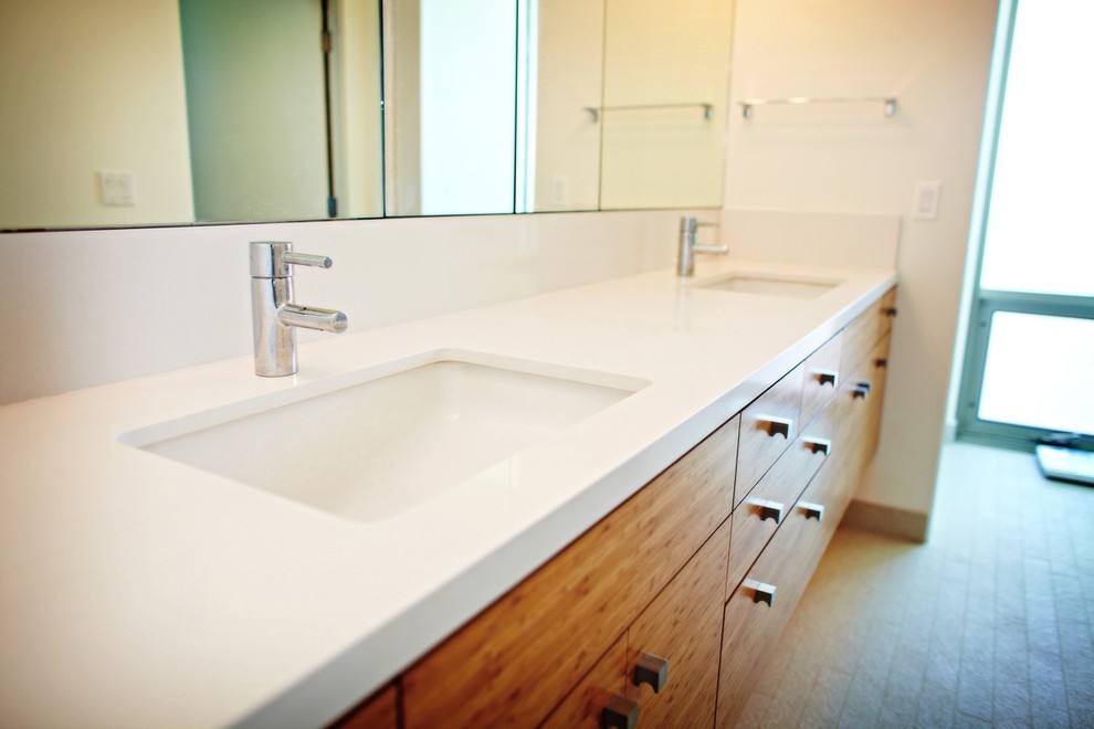 Photo of a large contemporary master bathroom in Seattle with flat-panel cabinets, medium wood cabinets, white walls, an undermount sink, quartzite benchtops and white benchtops.
