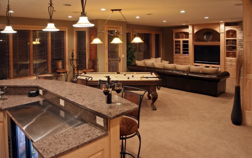 Inspiration for a large traditional walk-out basement in Cleveland with grey walls, carpet, no fireplace and brown floor.