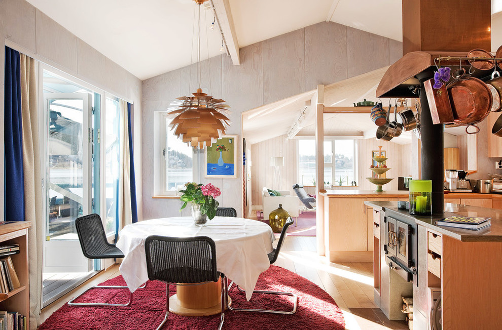 This is an example of a beach style family room in Stockholm.