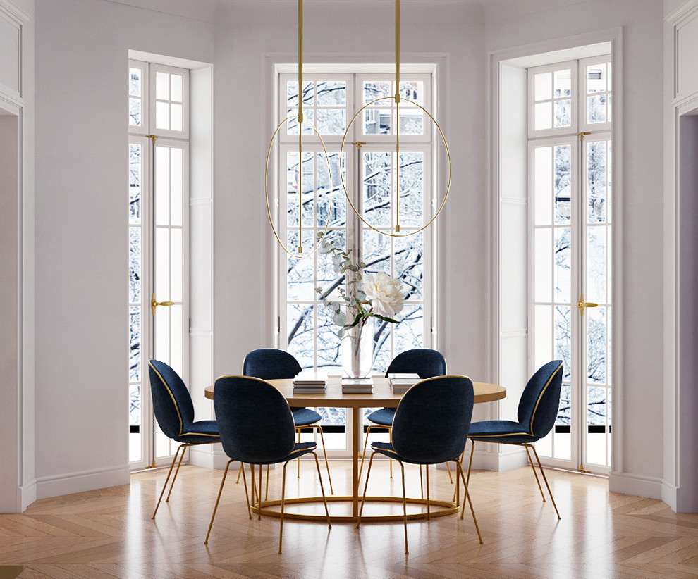 This is an example of a large scandinavian separate dining room in Moscow with white walls, light hardwood floors and brown floor.