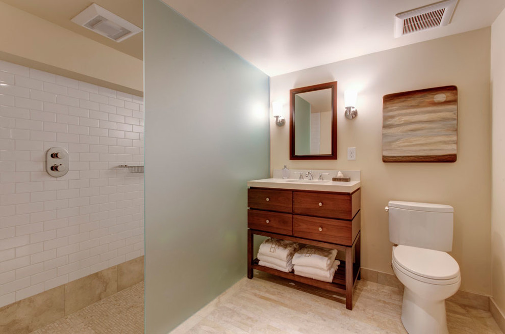 Inspiration for a transitional bathroom in Portland with an integrated sink and a curbless shower.