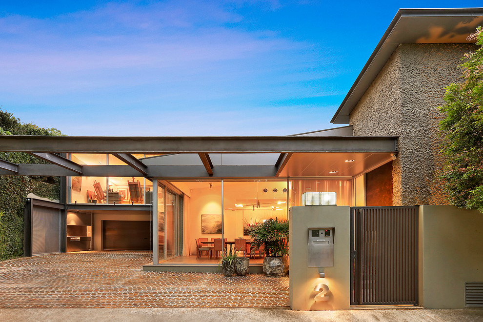 Inspiration for an expansive contemporary split-level concrete exterior in Sydney.