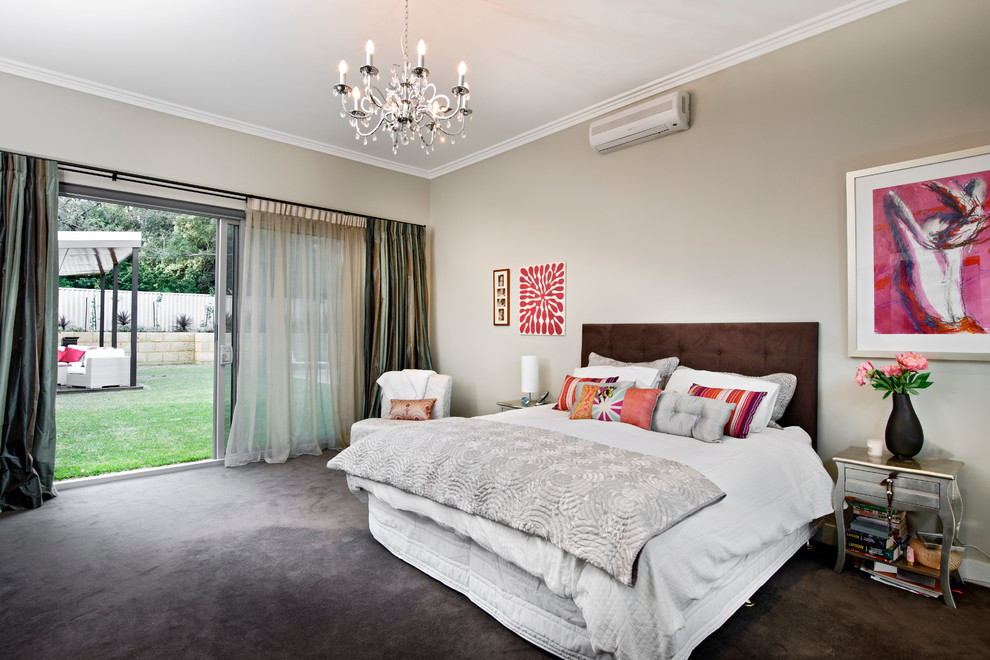 This is an example of a transitional master bedroom in Perth with grey walls and carpet.