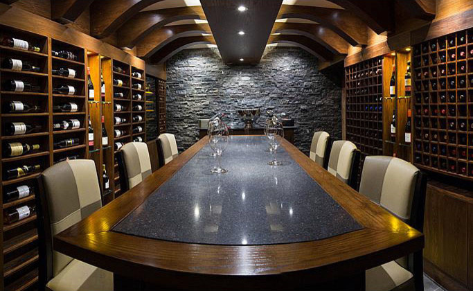 Inspiration for a mid-sized contemporary wine cellar in Channel Islands.