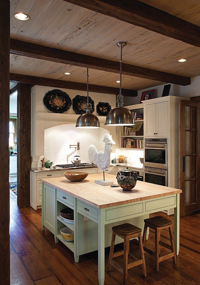 Design ideas for a traditional kitchen in Dallas with wood benchtops.