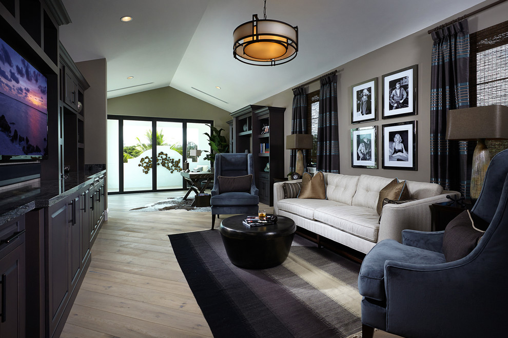 This is an example of a transitional home theatre in Miami.