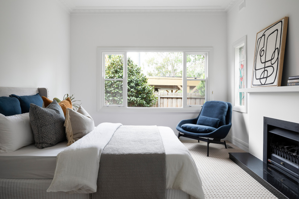 This is an example of a transitional bedroom in Melbourne.