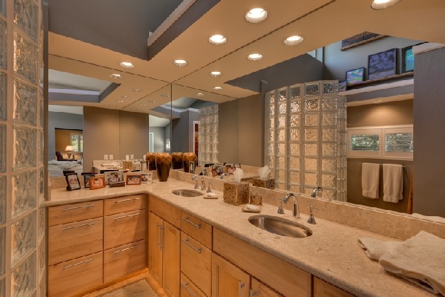 Design ideas for a large contemporary master bathroom in Cleveland with flat-panel cabinets, light wood cabinets, an open shower, a one-piece toilet, grey walls, slate floors, an undermount sink, granite benchtops and an open shower.