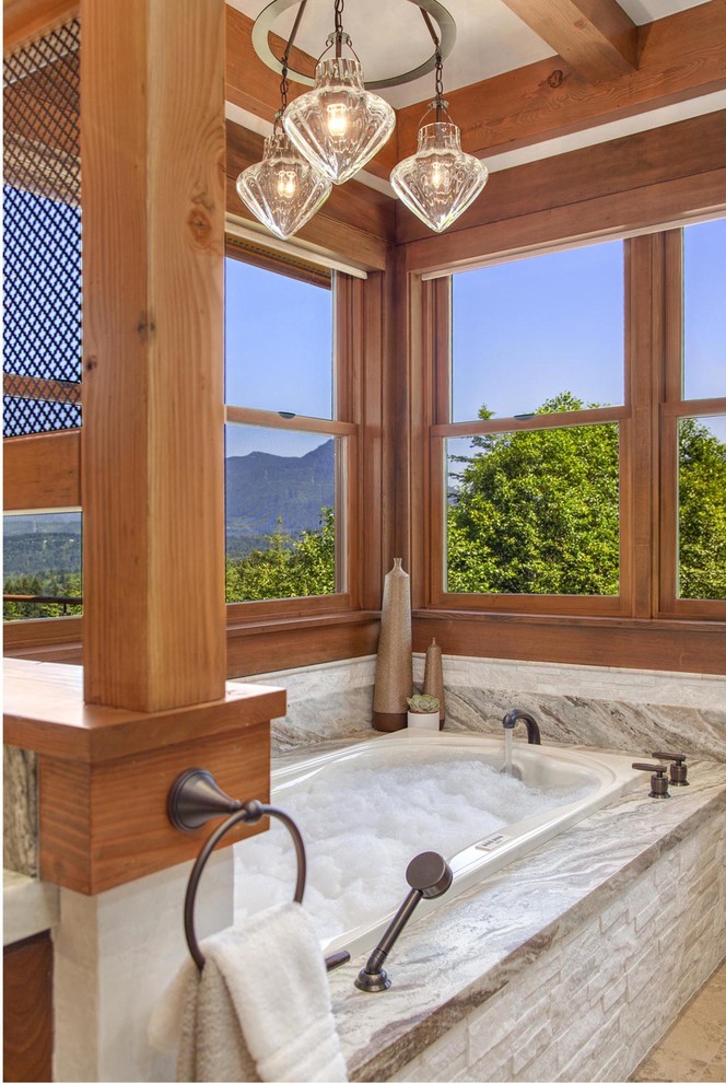 Inspiration for a rustic white tile and stone slab bathroom remodel in Seattle
