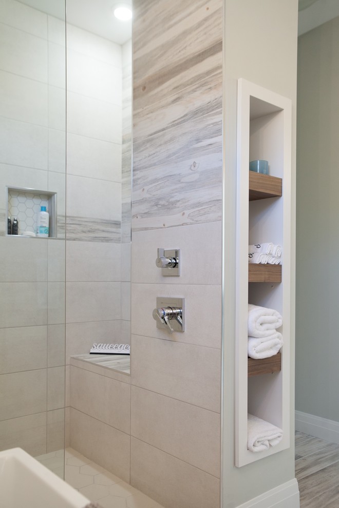 This is an example of a mid-sized country master bathroom in Other with flat-panel cabinets, brown cabinets, a freestanding tub, an open shower, grey walls, ceramic floors, an undermount sink, solid surface benchtops, beige floor, an open shower and beige benchtops.