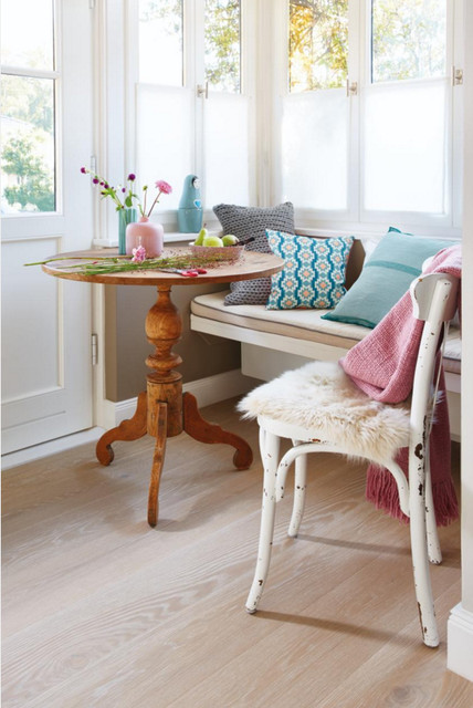 Flooring by Grain & Groove rustic-dining-room