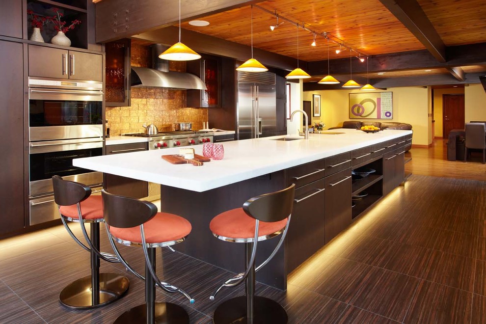 Design ideas for a contemporary kitchen in Miami with stainless steel appliances.